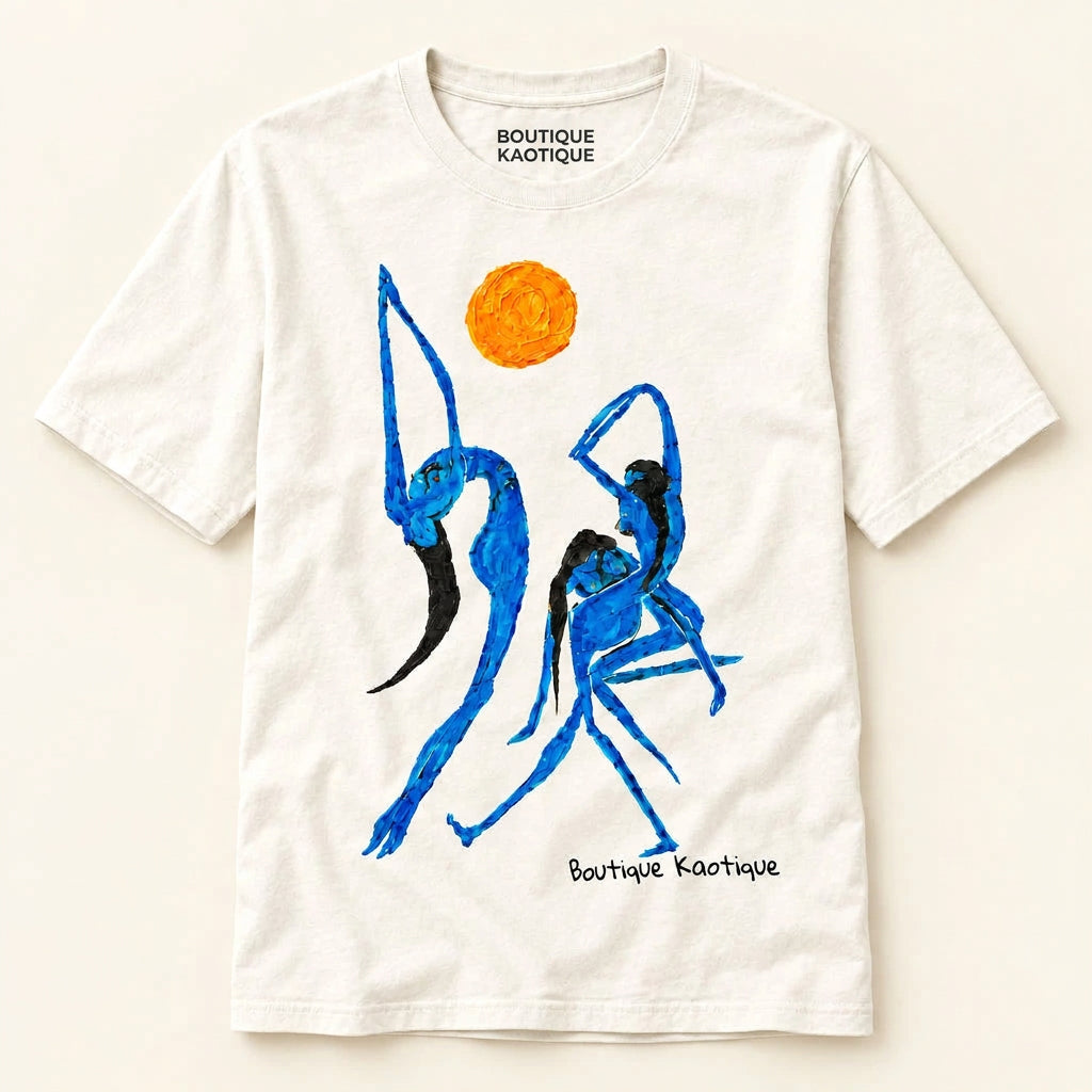 A organic cotton t-shirt with a graphic print of blue abstract figures and an orange sun on the front, along with the brand name 'BOKA'. Full Moon Party affirmation tee — white organic cotton t-shirt with moon print, unisex fit, multi-cause charity tee