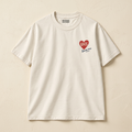 Front: Off-white organic cotton t-shirt with red KAOS heart and “loves me” script on left chest
