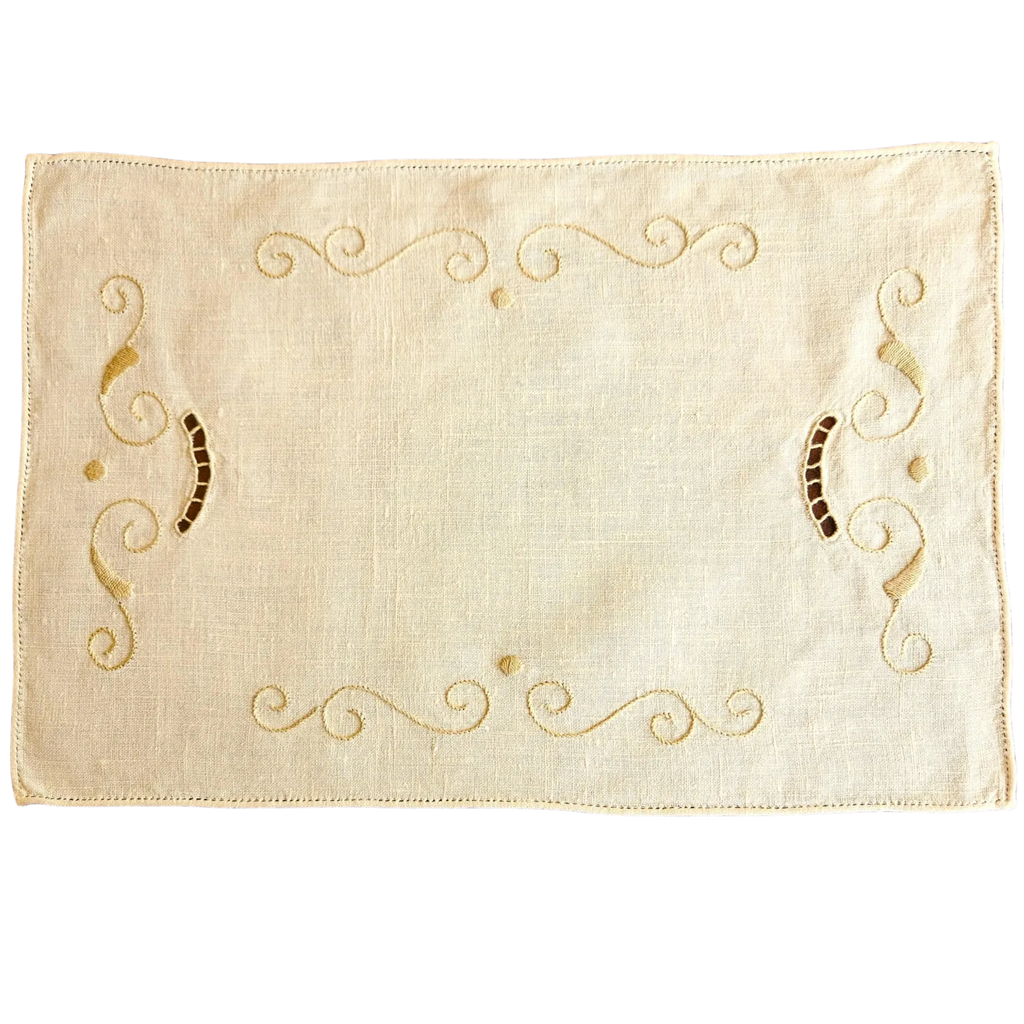 Set of 8 vintage ecru linen placemats, 40×27cm. Hand-embroidered cutwork scrolls, drawn thread hems. Excellent condition. The Home Edit by Boutique Kaotique.