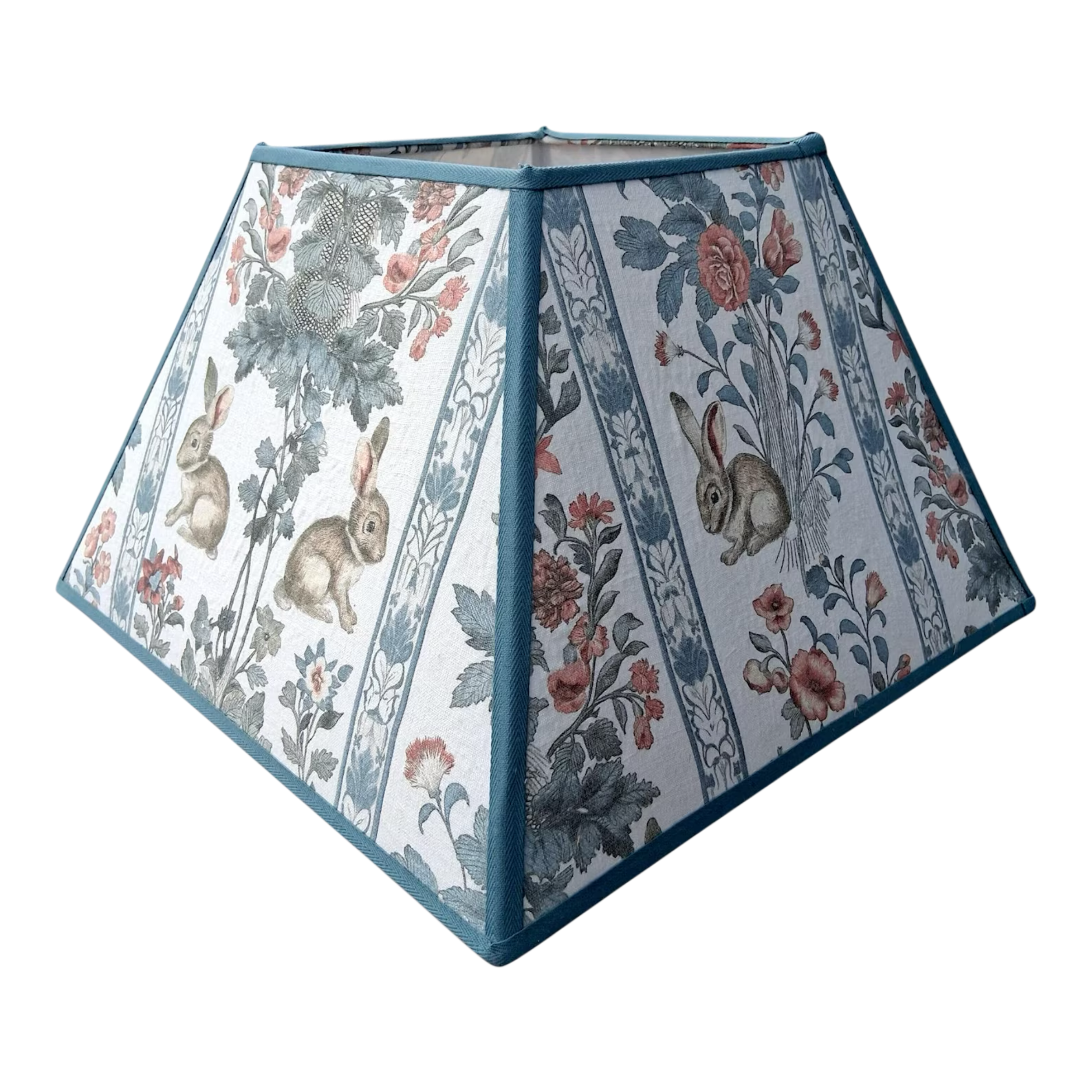 Decorative lampshade with floral and rabbit pattern on a white background