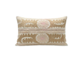 Decorative pillow with intricate patterns on a white background
