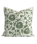 Decorative pillow with green floral pattern on a white background