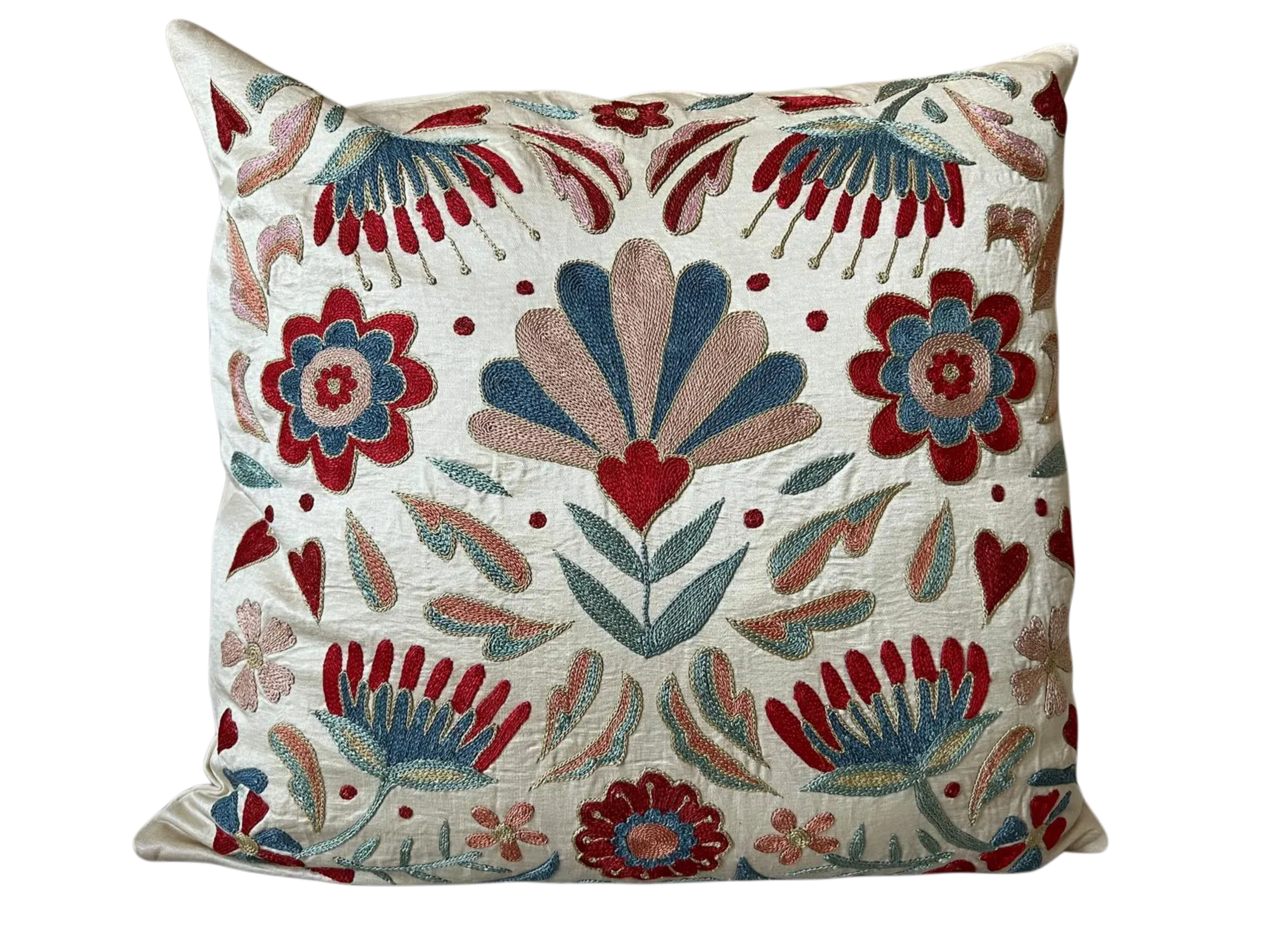 Decorative pillow with floral and leaf patterns on a white background