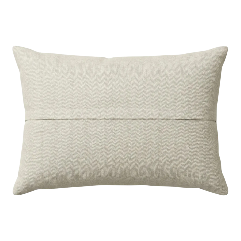 Beige fabric pillow on a white background