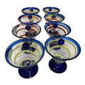 Rare full set of 8 Kosta Boda Royal Caribbean martini glasses. Hand-blown, cobalt base, mixed swirl colours. No longer made. The Home Edit by Boutique Kaotique.