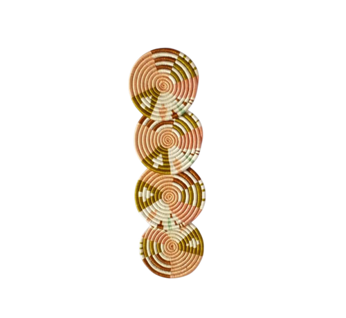Set of four Nziza handwoven natural sisal and grass coasters made by female artisans in Rwanda, earthy tones, unique woven patterns, Boutique Kaotique Home Edit