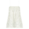 White lace dress on a white background. Indonesian lace dress top — handmade lace designer top from Maryallé Jakarta, fitted, limited edition occasion piece