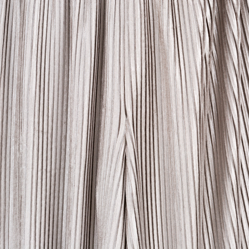 Close-up of gray hair color swatch. Silver velvet trousers — handmade silver velvet designer trousers from Patrick Owen Jakarta, tailored fit, limited edition