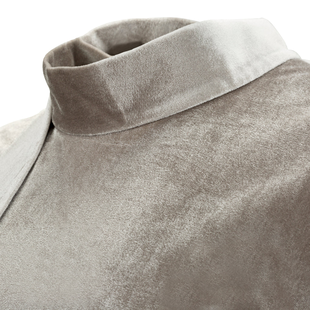 Close-up of a gray shirt with a collar on a white background. Silver velvet top — handmade silver velvet designer top from Patrick Owen Jakarta, fitted, limited edition occasion piece