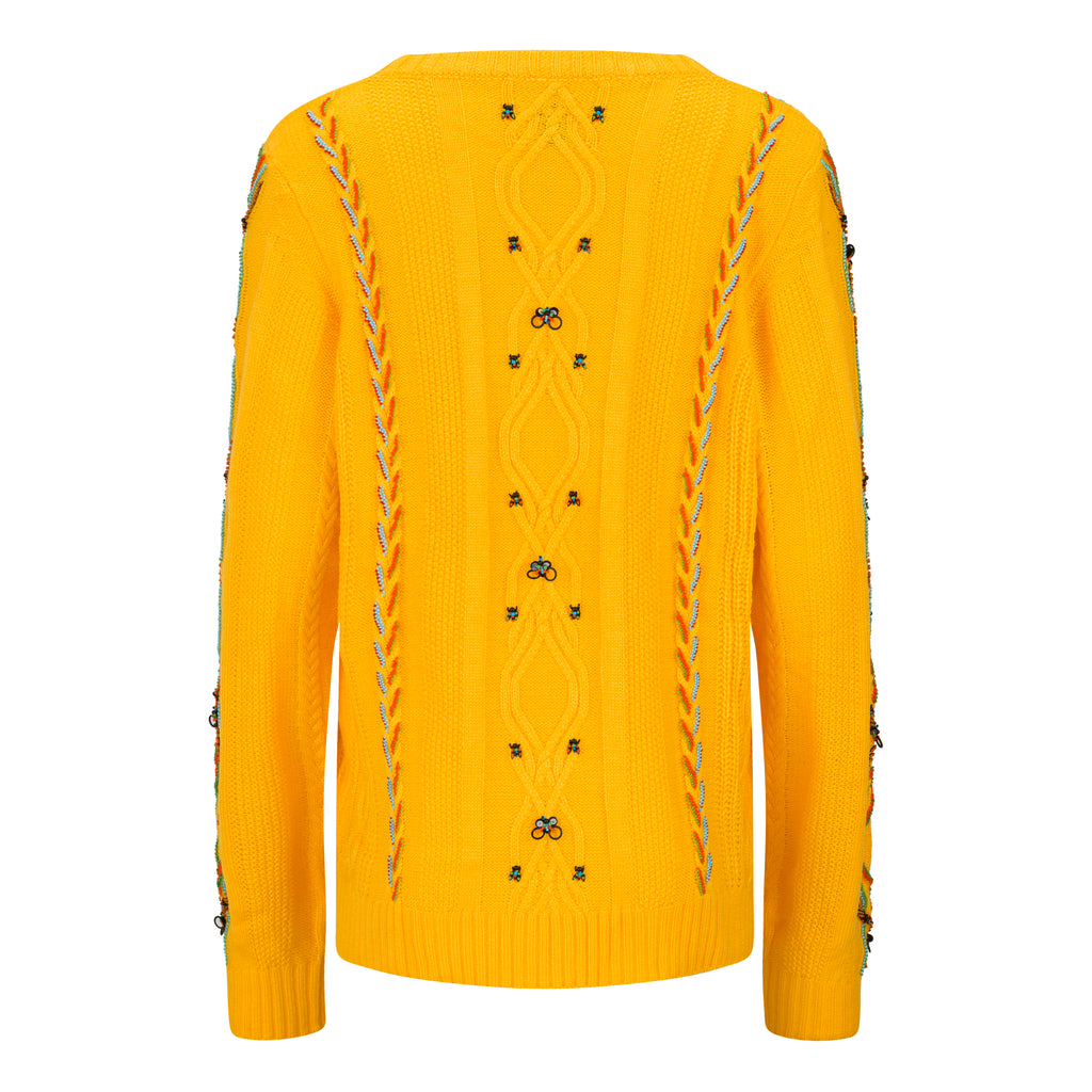Yellow sweater with intricate patterns on a white background. Yellow bug wool jumper — handmade yellow wool designer jumper with bug print from Patrick Owen Jakarta, relaxed fit, limited edition