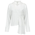 White blouse with a subtle pattern on a white background. White dotted blouse — handmade white designer blouse with delicate dot print from Major Minor Jakarta, relaxed fit, limited edition
