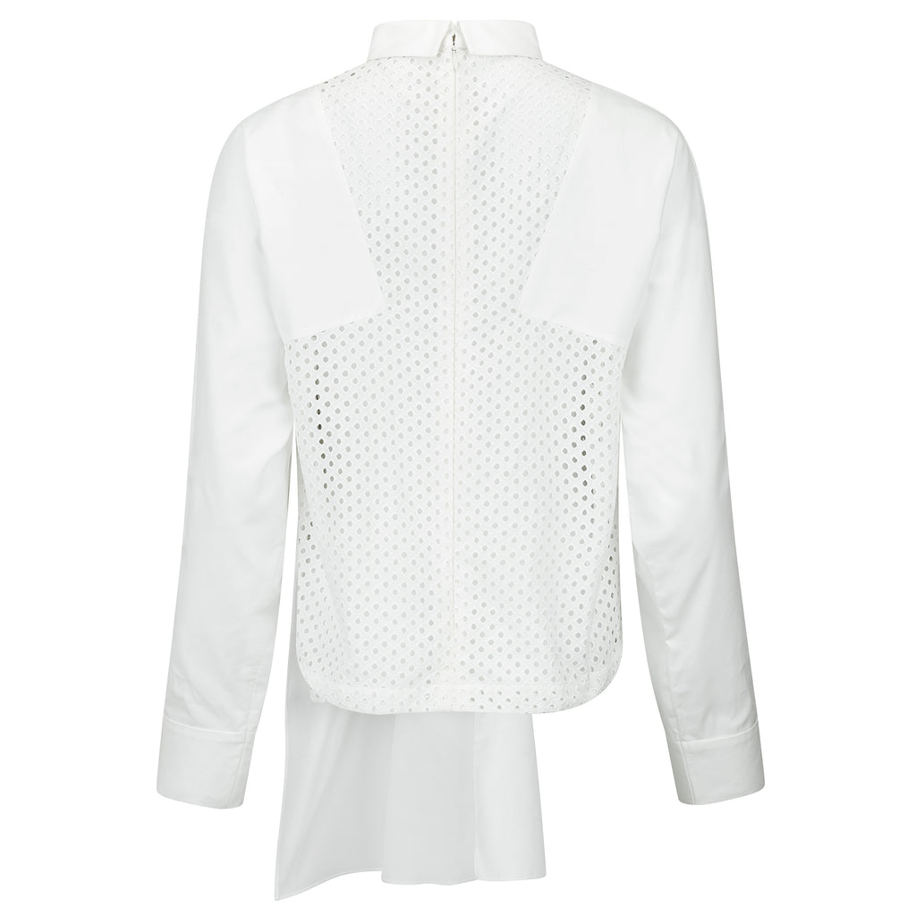 White shirt with a unique pattern on a white background. White dotted blouse — handmade white designer blouse with delicate dot print from Major Minor Jakarta, relaxed fit, limited edition