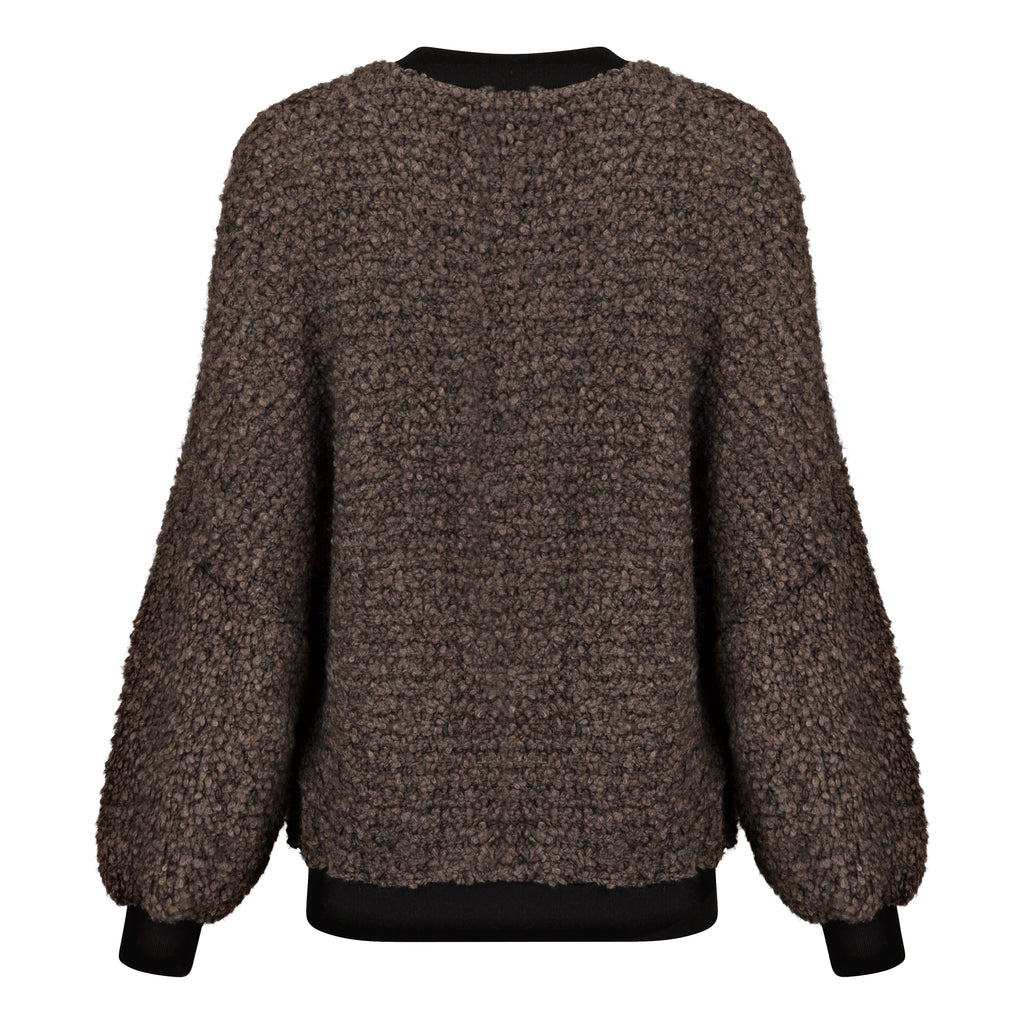 Textured sweater with black cuffs on a white background. Chocolate wool cashmere jumper — handmade brown wool blend designer jumper from Hanout Boutique Marrakech, relaxed fit, limited edition
