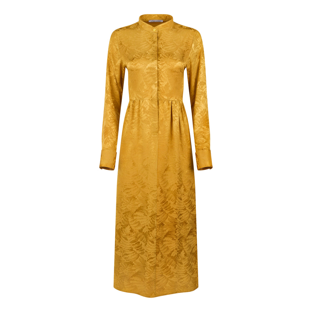 Yellow gold dress with long sleeves on a white background. Golden Hour dress — handmade yellow gold designer dress from Hanout Boutique Marrakech, fitted, limited edition occasion piece