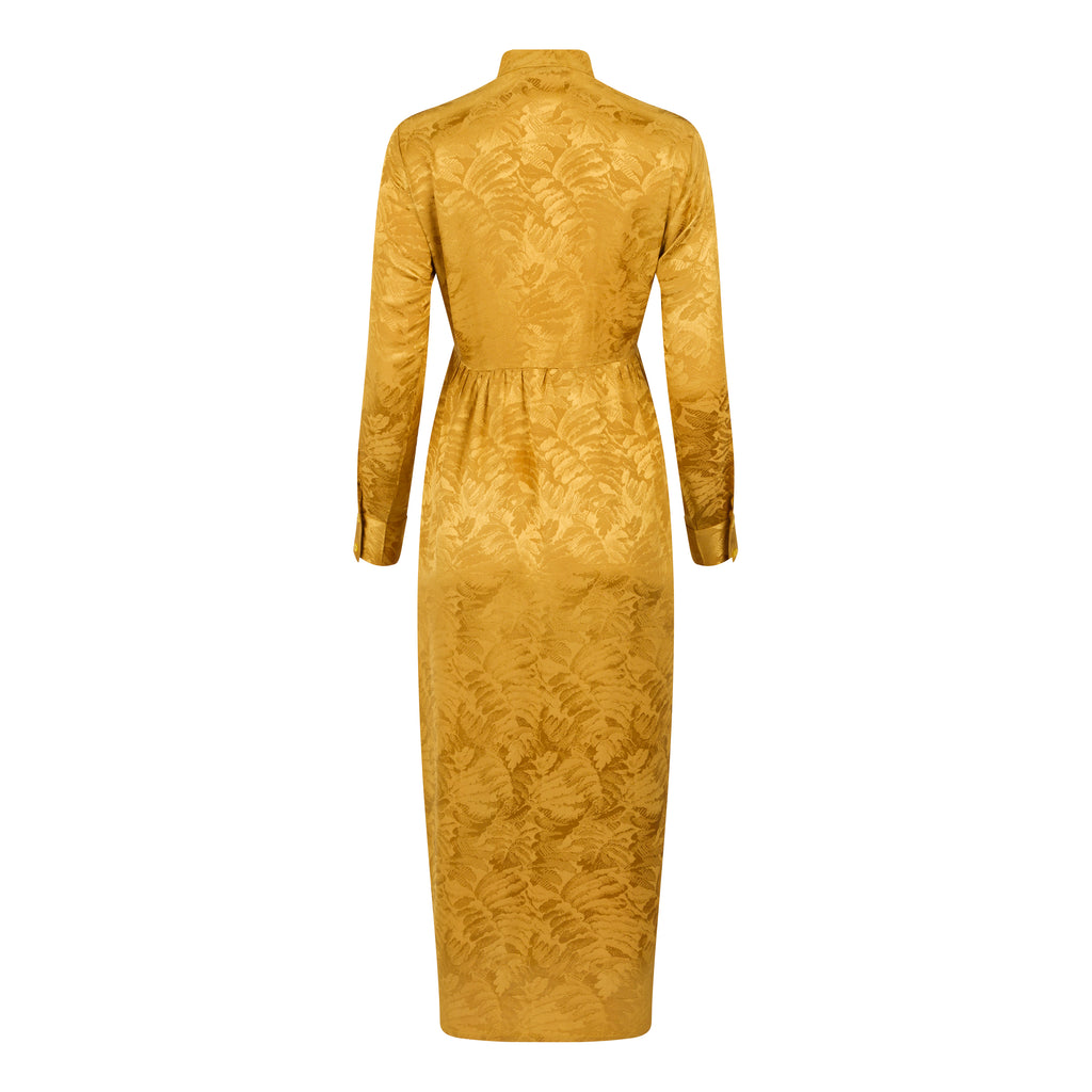 Gold dress with long sleeves on a white background. Golden Hour dress — handmade yellow gold designer dress from Hanout Boutique Marrakech, fitted, limited edition occasion piece