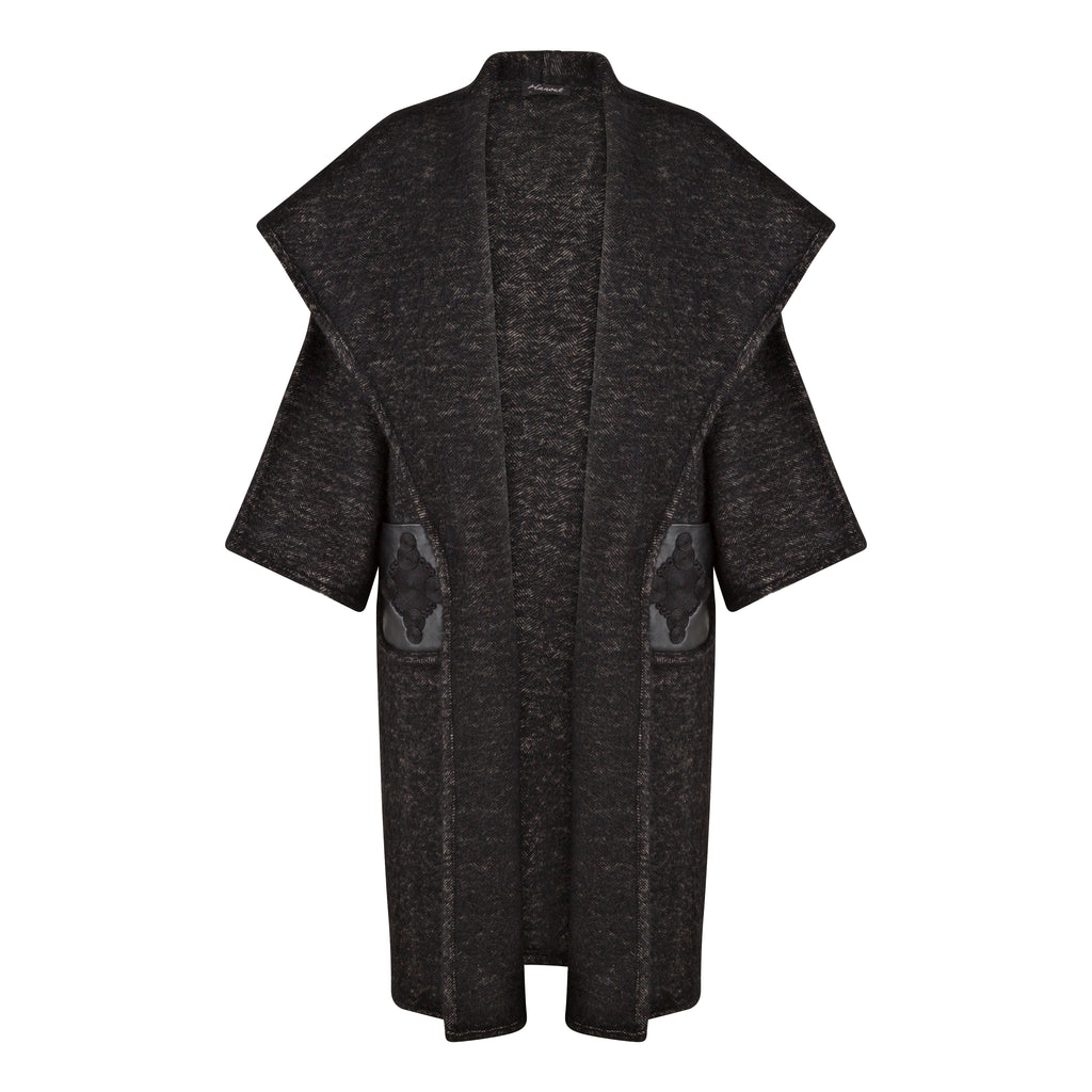 Dark gray cardigan with geometric patterns on a white background. Wool embroidered coat — heavy wool designer coat with hand-embroidered detail from Hanout Boutique Marrakech, limited edition