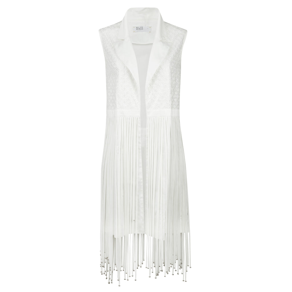 White fringe vest on a white background. Indonesian stringy vest — handmade designer cotton vest with string detail from Major Minor Jakarta, relaxed fit, limited edition