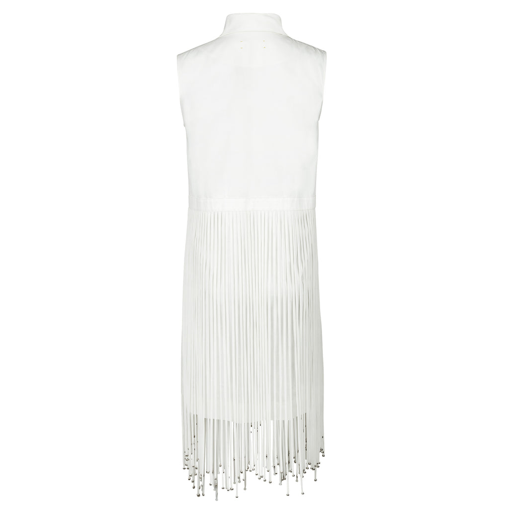 White sleeveless top with fringe details on a white background. Indonesian stringy vest — handmade designer cotton vest with string detail from Major Minor Jakarta, relaxed fit, limited edition