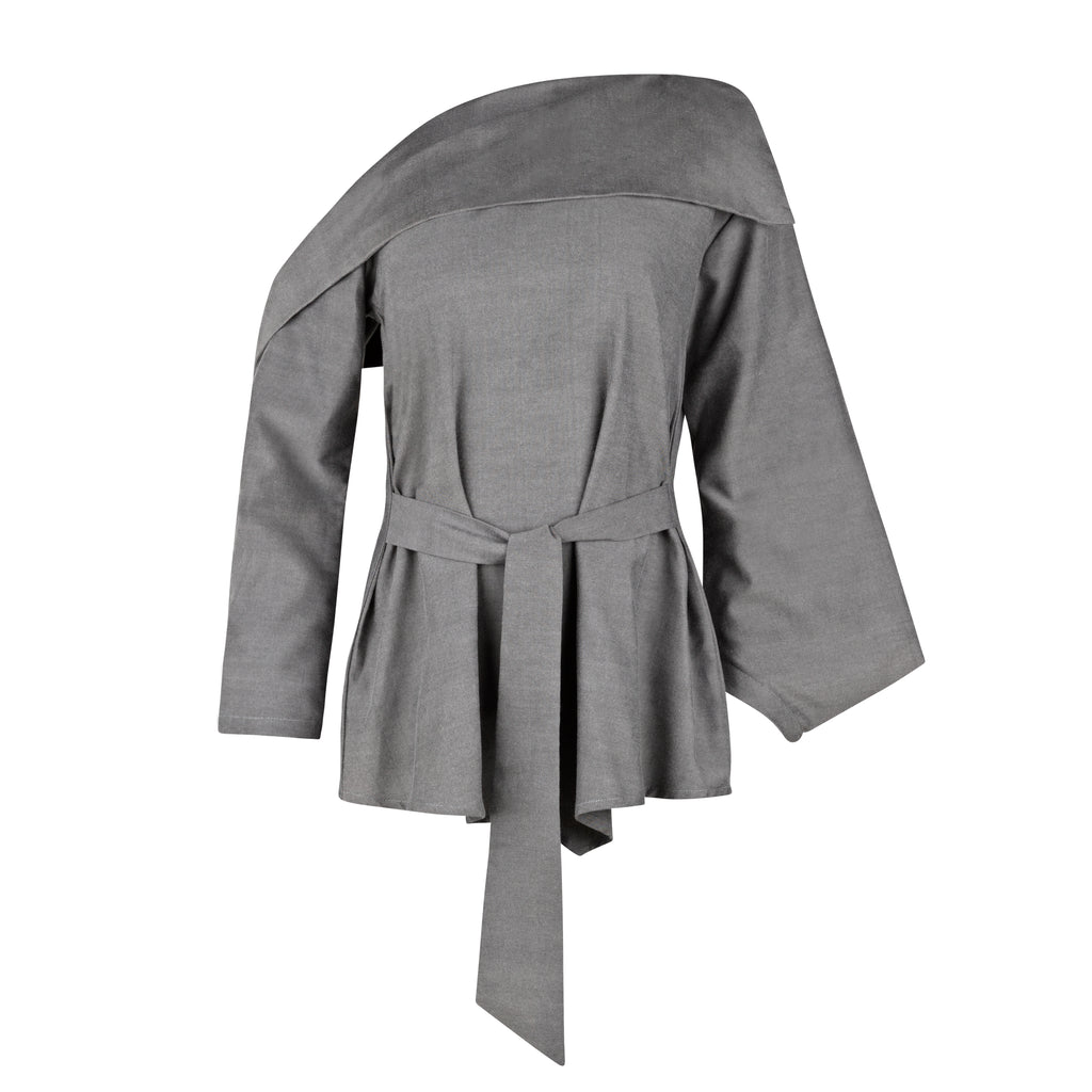 Gray blouse with a belt on a white background. Indonesian asymmetrical blouse — handmade asymmetric designer blouse from Maryallé Jakarta, fitted, limited edition piece