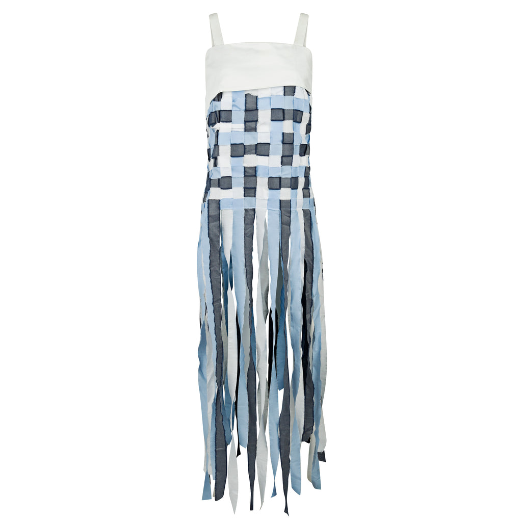 Dress with a white top and plaid, fringed skirt on a white background. Indonesian stringy top — handmade designer cotton top with string detail from Major Minor Jakarta, relaxed fit, limited edition