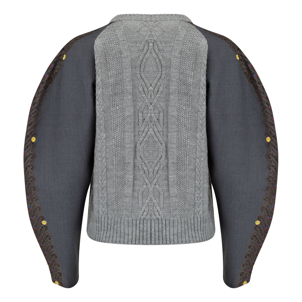 Gray sweater with black sleeves and yellow buttons on a white background. Knitted bomber jacket — handmade designer knitted bomber from Patrick Owen Jakarta, relaxed fit, limited edition winter piece