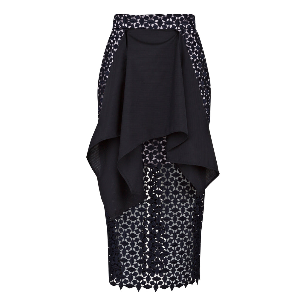 Black skirt with patterned sides on a white background. Indonesian-inspired lace skirt — handmade lace designer skirt from Maryallé Jakarta, fitted, limited edition occasion piece