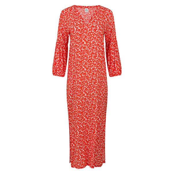 Orange floral dress on a white background. Moroccan orange floral cover up — handmade orange cotton kaftan with floral print from Owl Marrakech, limited edition