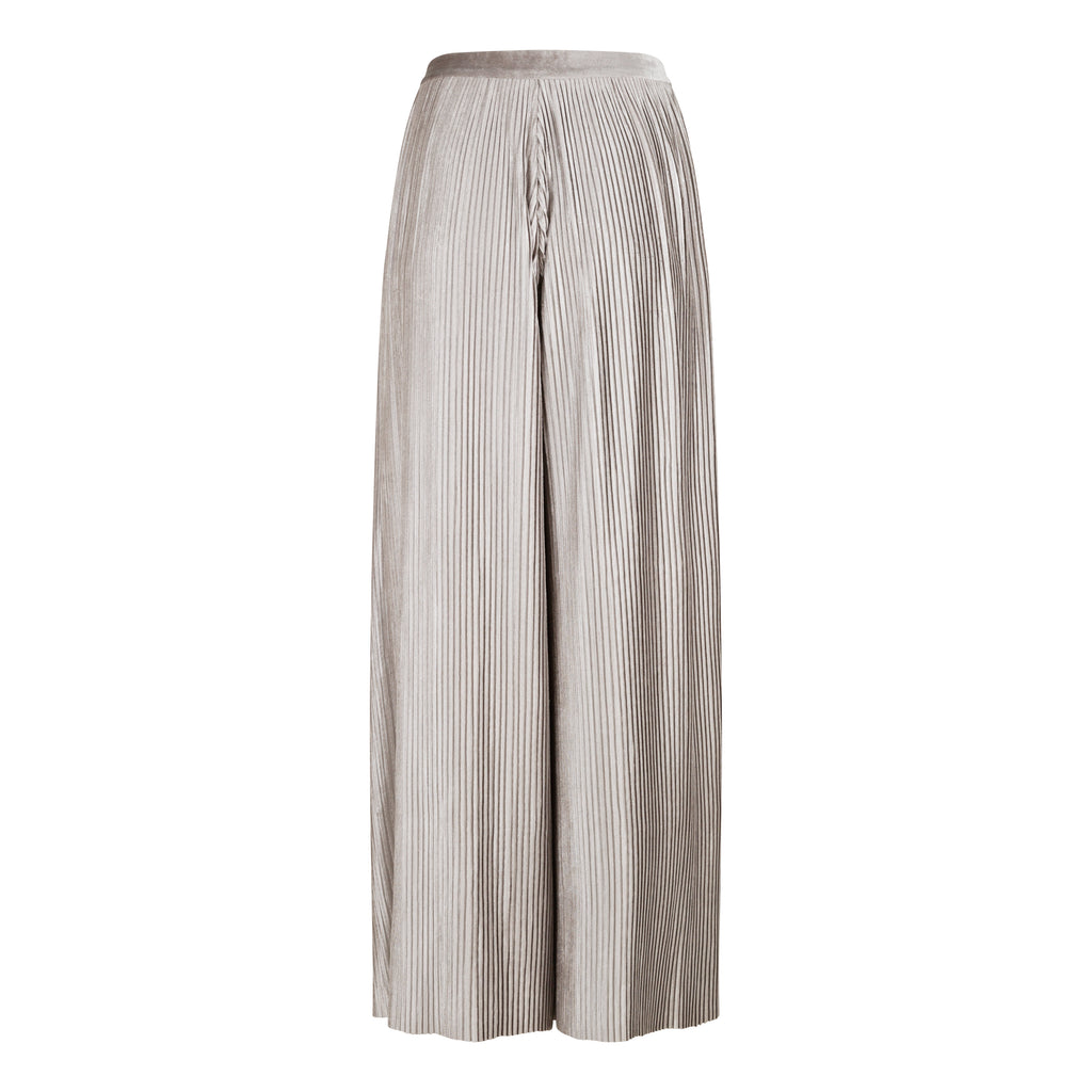 Striped wide-leg pants on a white background. Silver velvet trousers — handmade silver velvet designer trousers from Patrick Owen Jakarta, tailored fit, limited edition