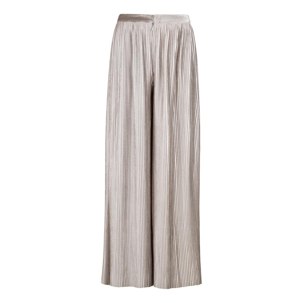 Striped wide-leg pants on a white background. Silver velvet trousers — handmade silver velvet designer trousers from Patrick Owen Jakarta, tailored fit, limited edition