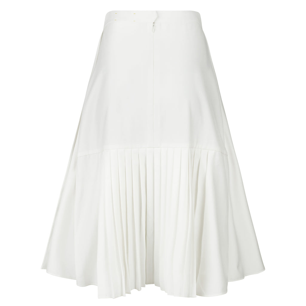 White pleated skirt on a white background. Indonesian asymmetrical skirt — handmade asymmetric designer skirt from Major Minor Jakarta, relaxed fit, limited edition