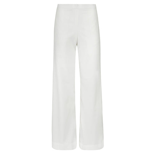 White wide-leg pants on a white background. Double coloured trousers — handmade designer two-tone trousers from Major Minor Jakarta, relaxed fit, limited edition piece