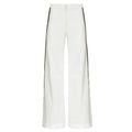 White pants with a subtle pattern on a white background. Striped trousers — handmade designer striped cotton trousers from Major Minor Jakarta, relaxed fit, limited edition summer