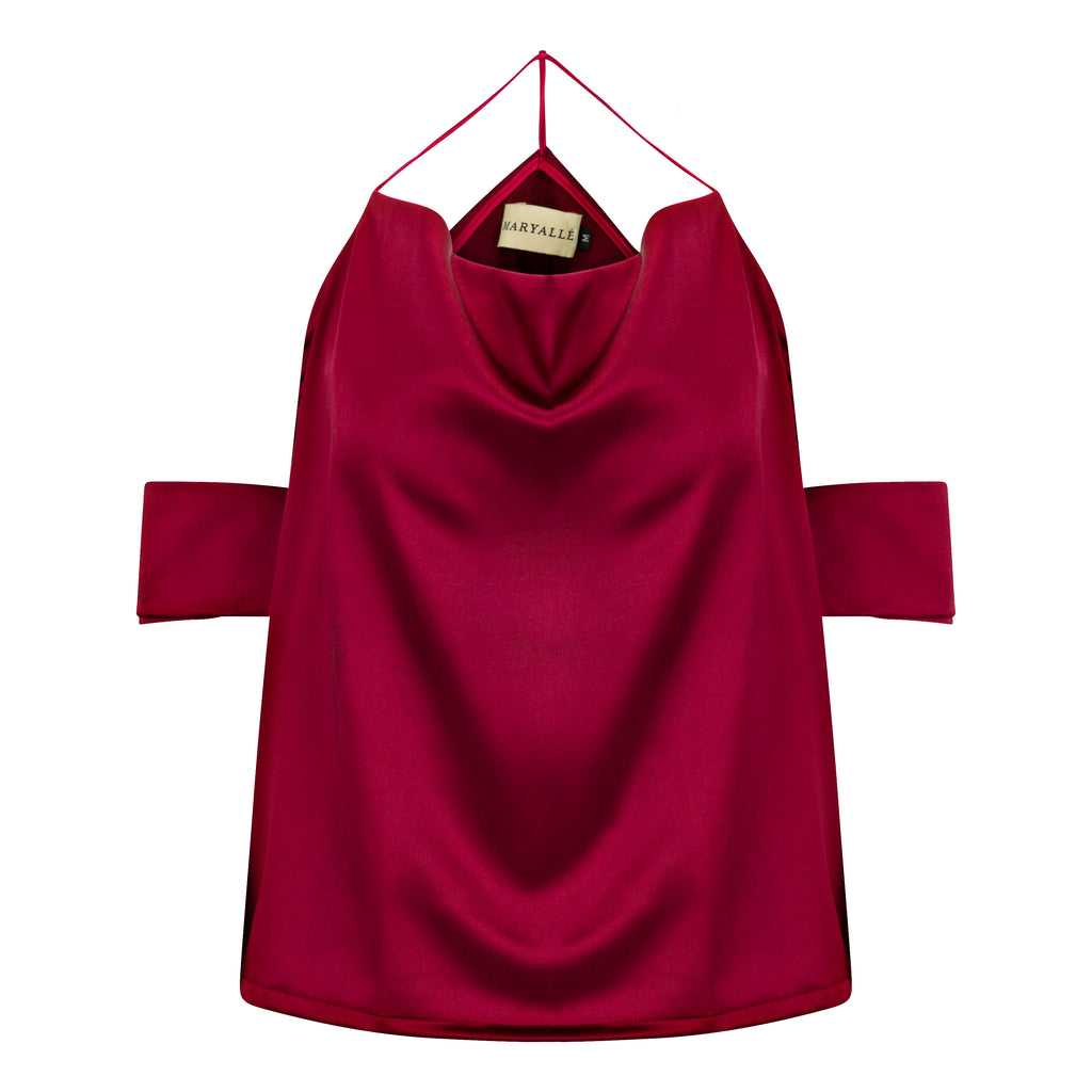 Maroon off-shoulder top on a hanger with a visible brand label against a white background. Cut out burgundy top — handmade burgundy designer top with cut-out detail from Maryallé Jakarta, fitted, limited edition