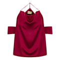 Maroon off-shoulder top on a hanger with a visible brand label against a white background. Cut out burgundy top — handmade burgundy designer top with cut-out detail from Maryallé Jakarta, fitted, limited edition