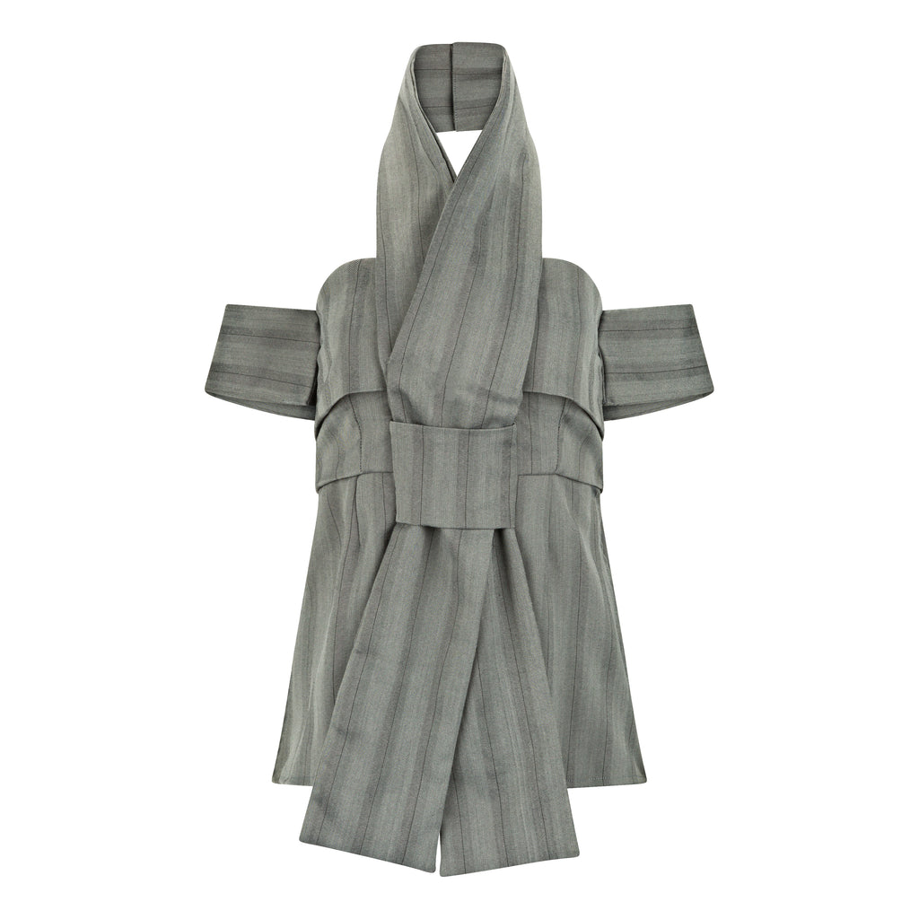 Gray blouse with wide sleeves on a white background. Indonesian cut-out shirt — handmade designer shirt with cut-out detail from Maryallé Jakarta, fitted, limited edition
