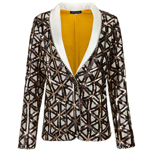 Patterned blazer with a yellow shirt underneath on a white background. Triangular sequin blazer — black designer blazer with hand-stitched triangular sequin pattern from Laure Welfling Marrakech, limited edition