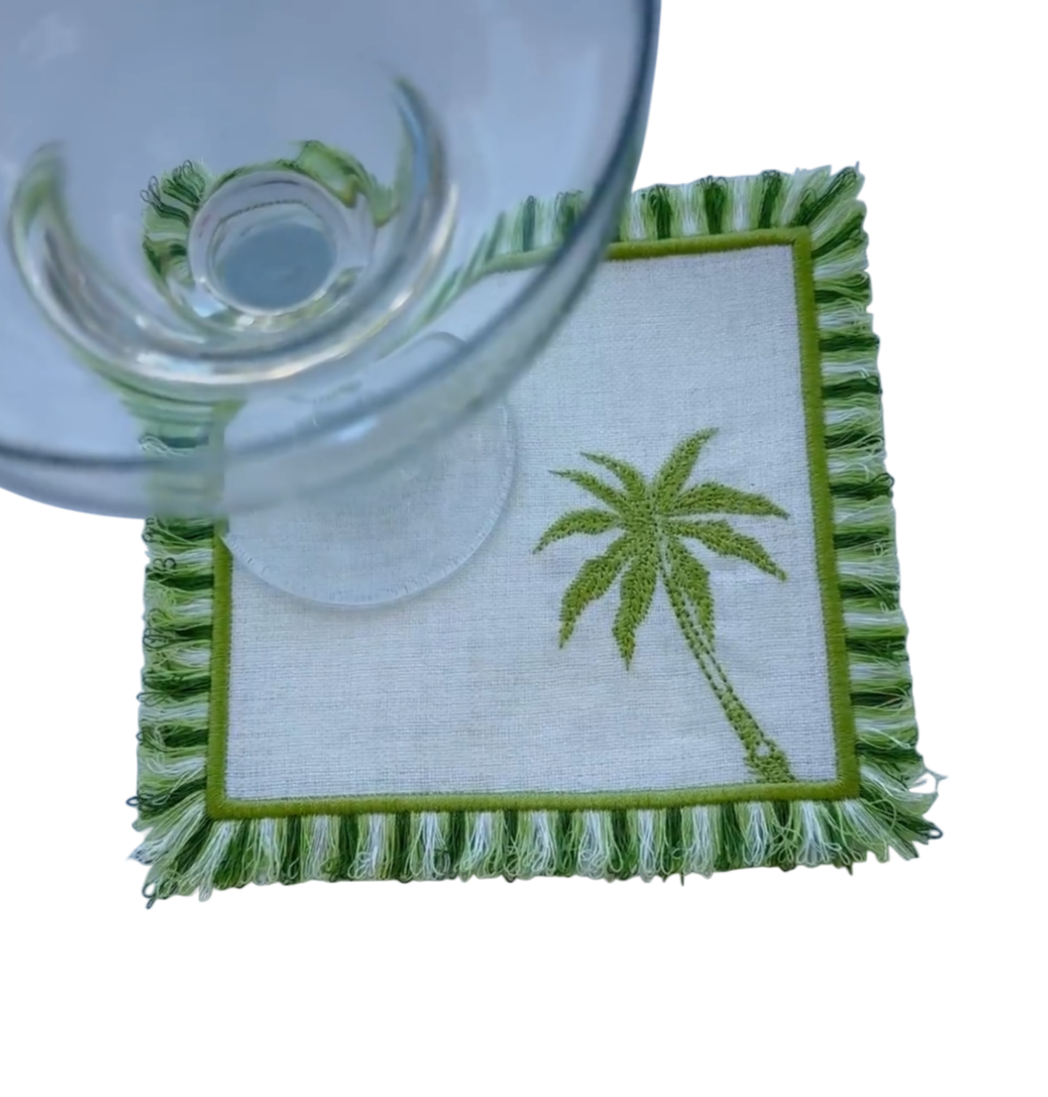Coaster with palm tree design on a white background