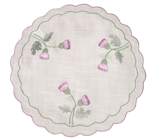 Round embroidered cloth with pink flowers and green leaves on a white background. Platemat