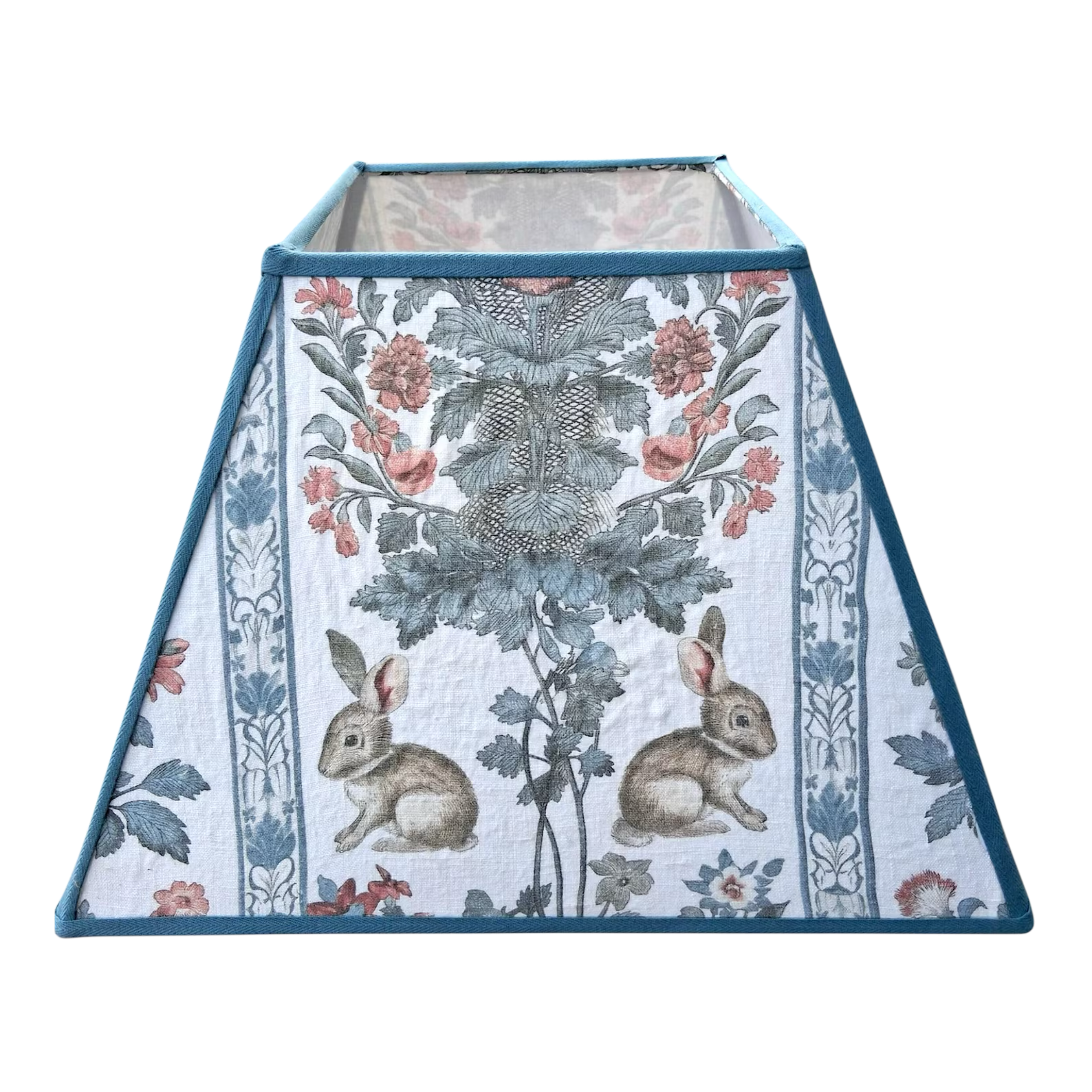 Decorative lampshade with floral and rabbit pattern on a white background