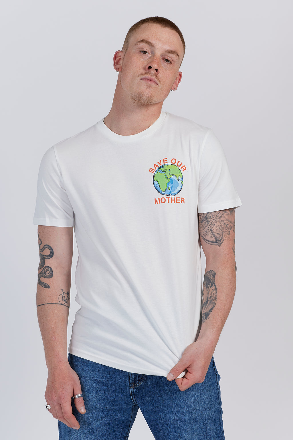 Save Our Mother climate tee — white organic cotton t-shirt with hand-illustrated earth print, unisex fit, climate charity tee