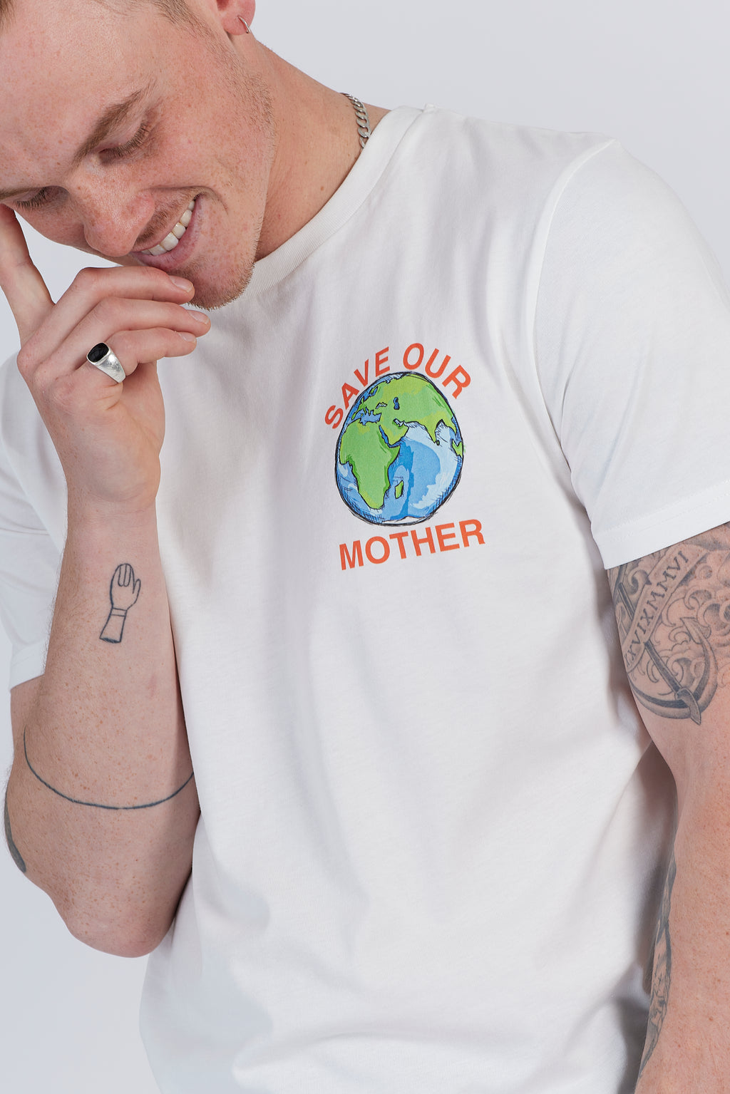Save Our Mother climate tee — white organic cotton t-shirt with hand-illustrated earth print, unisex fit, climate charity tee. globe world design on tshirt