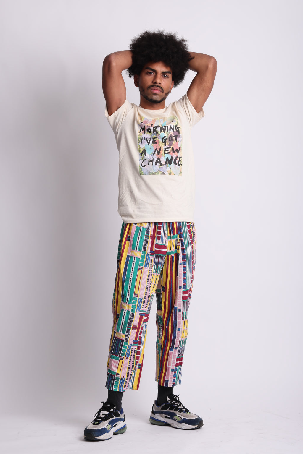A organic cotton t-shirt with a printed front featuring the text 'EVERY MORNING I'VE GOT A NEW CHANCE' surrounded by a multicolored abstract design. Every Morning affirmation tee — white organic cotton t-shirt with mental health print, unisex fit, charity tee by emerging artist