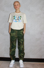 Load image into Gallery viewer, Surrounded by Flowers Organic Cotton T-Shirt.
